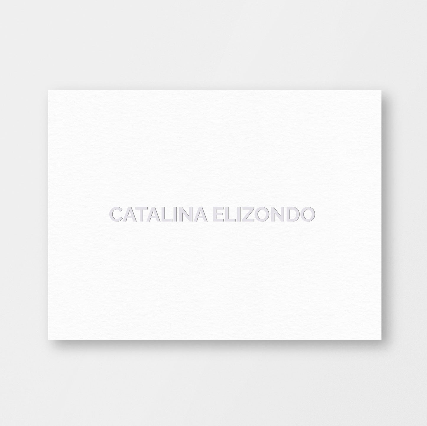 Single white cotton embossed card